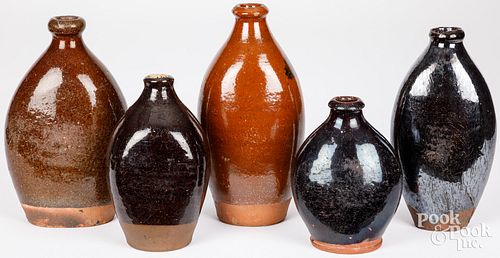 FIVE REDWARE BOTTLES/FLASKS, 19TH