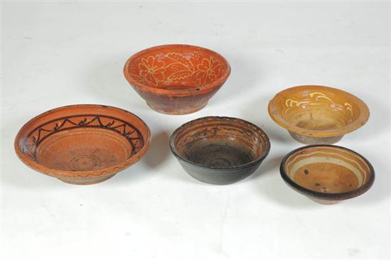 FIVE REDWARE MILK BOWLS. 