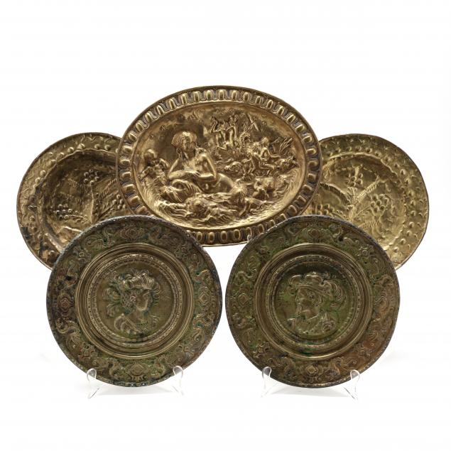 FIVE REPOUSSé BRASS WALL MOUNTS