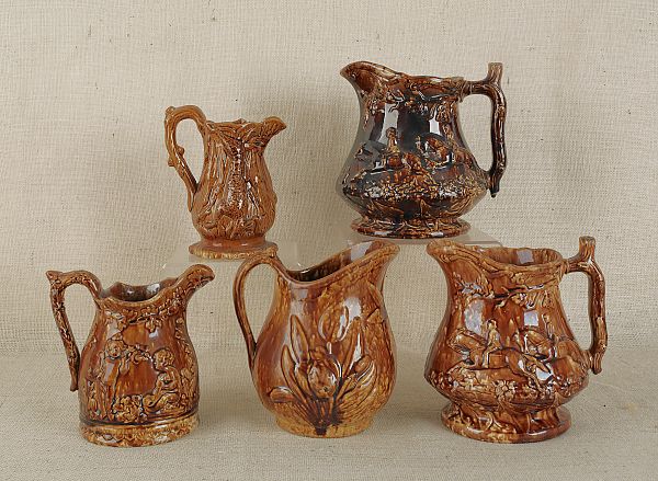Five Rockingham glaze pitchers 19th