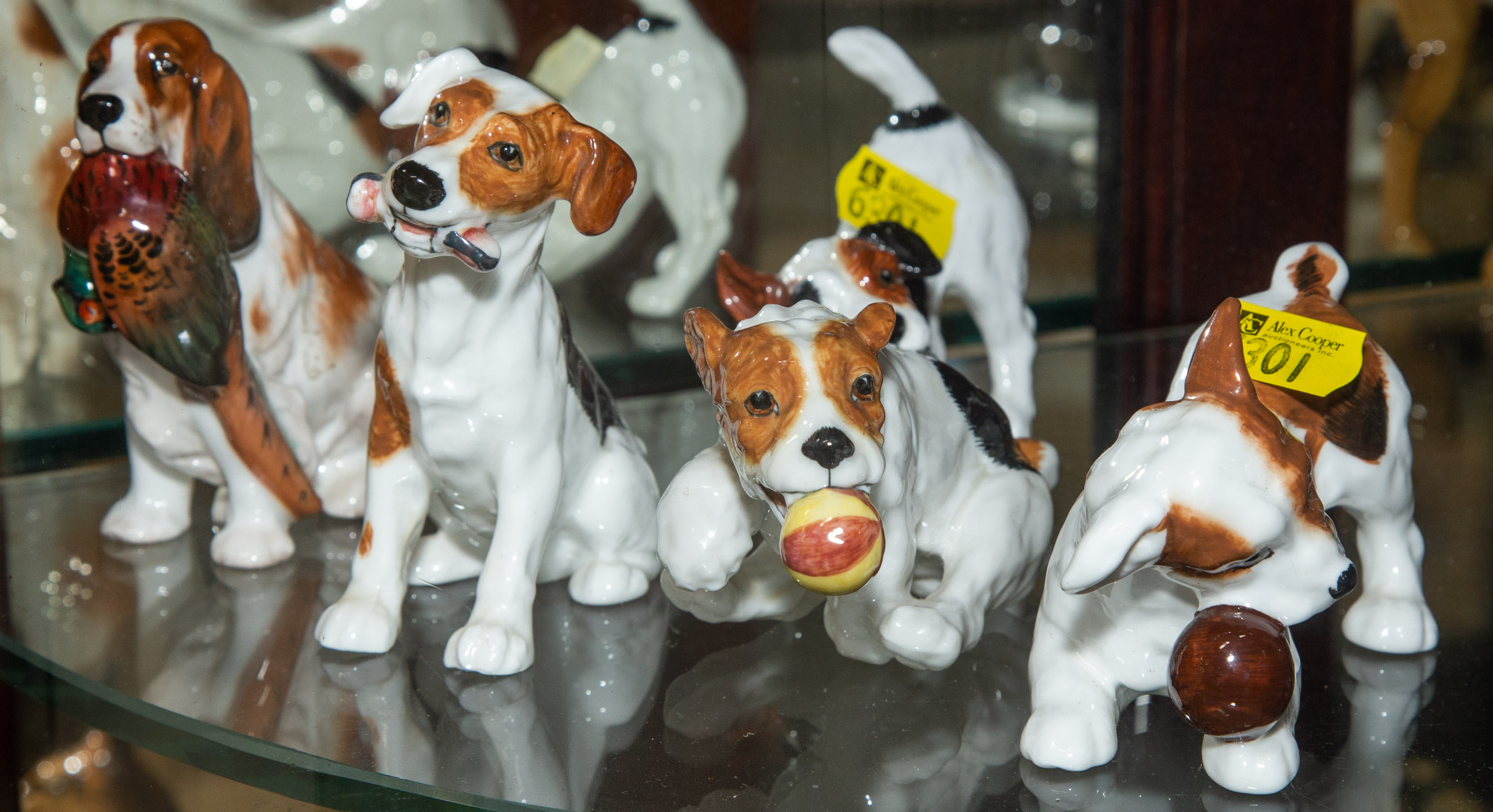 FIVE ROYAL DOULTON DOG FIGURES .