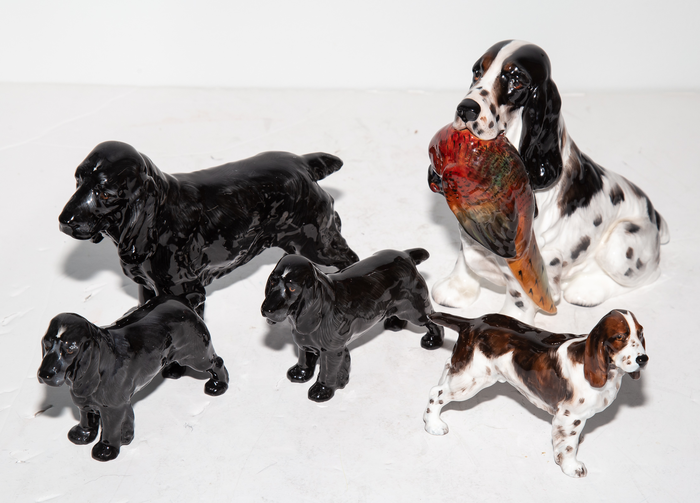 FIVE ROYAL DOULTON SPANIEL DOG