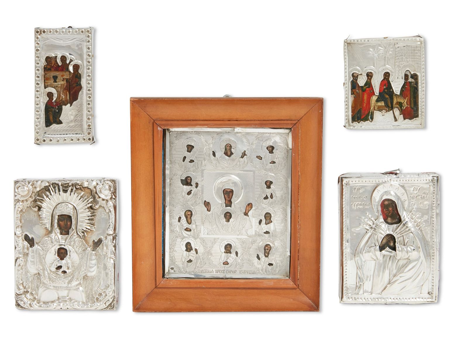 FIVE RUSSIAN ICONS WITH SILVER