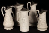 Five saltware jugs, decorated