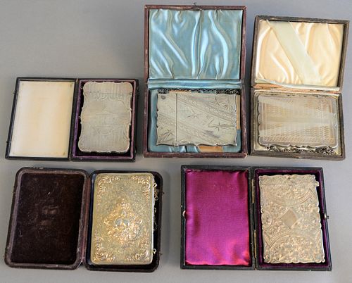 FIVE SILVER CASES IN ORIGINAL
