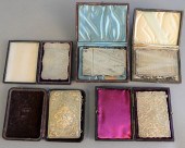 FIVE SILVER CASES IN ORIGINAL