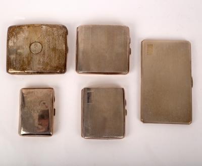 Five silver cigarette cases,