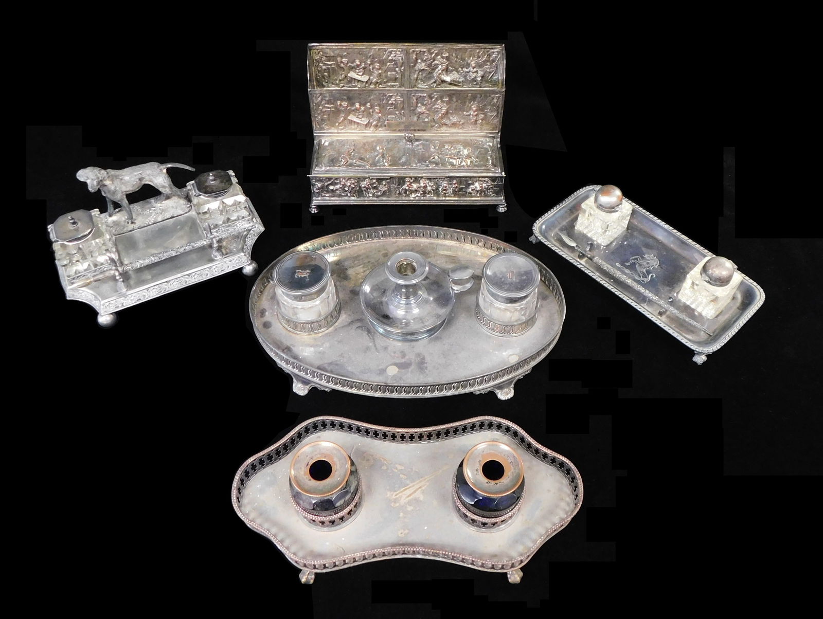 FIVE SILVER PLATE INKWELL STANDS,