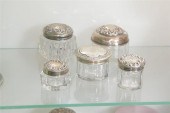 FIVE SMALL GLASS DRESSER JARS