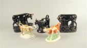 Five Staffordshire cow figure