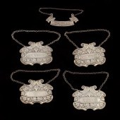 FIVE STERLING SILVER BOTTLE TI