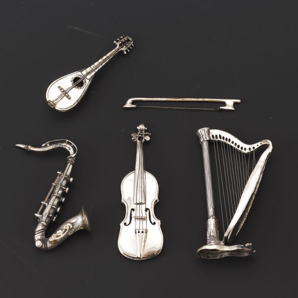 FIVE STERLING SILVER DOLL HOUSE