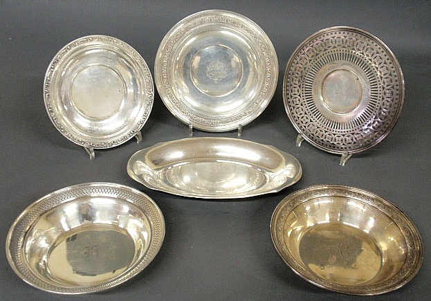 Five sterling silver plates and