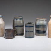 Five Stoneware Bottles and Can