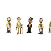 Five Tin Lithograph Figural Wi