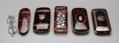 Five tortoise spectacles cases: