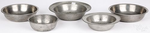 FIVE UNMARKED PEWTER BASINS,