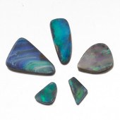 FIVE UNMOUNTED 23.85 CT TOTAL