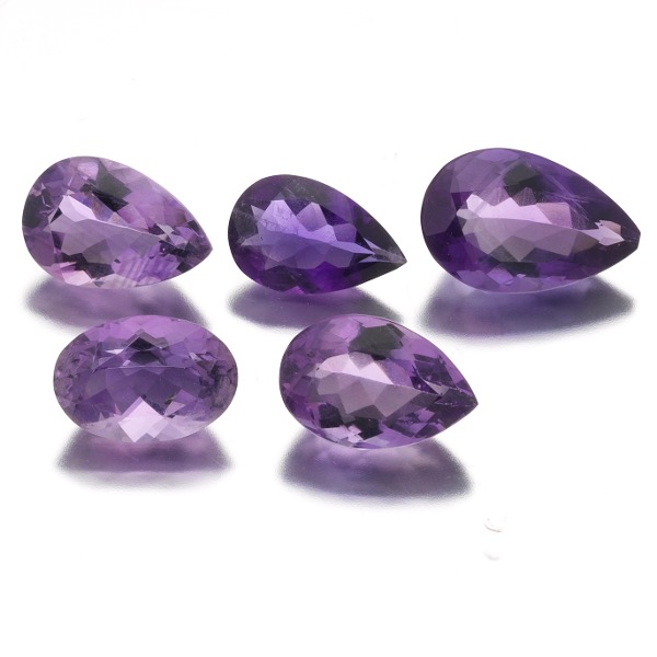 FIVE UNMOUNTED 28.46 CT TOTAL