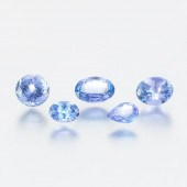 FIVE UNMOUNTED 7.95 CARAT TOTA
