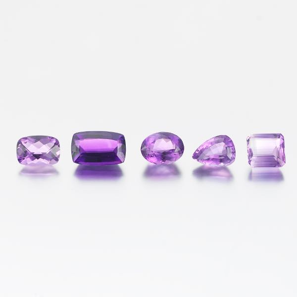 FIVE UNMOUNTED 80.12 CT TOTAL