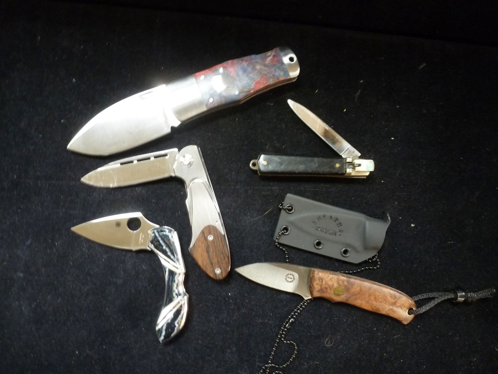 FIVE UPSCALE FOLDING BLADE