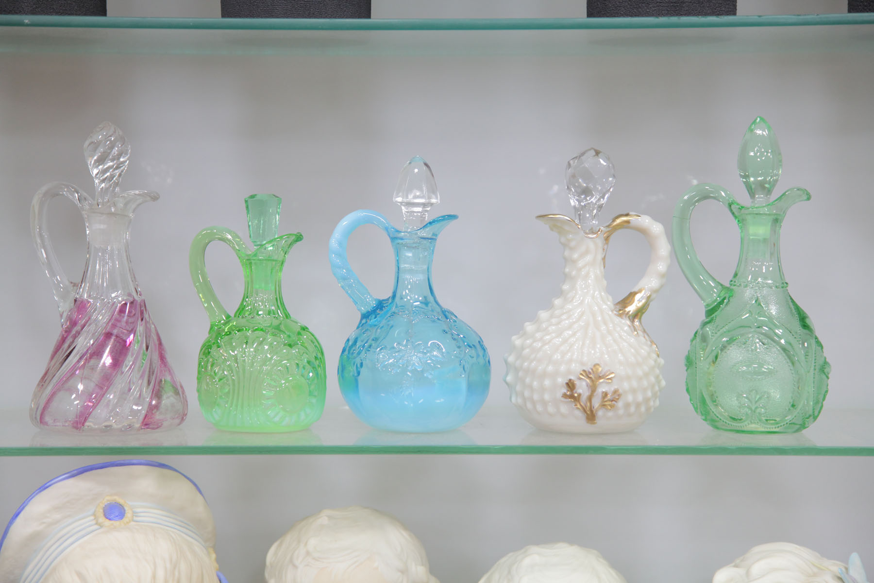 FIVE VICTORIAN ART GLASS CRUETS. 