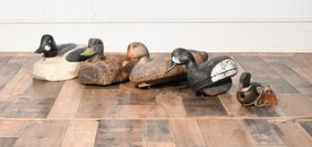 Five vintage duck decoys, including