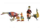FIVE VINTAGE WIND-UP TOYScompr