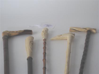 Five walking sticks with ivory,