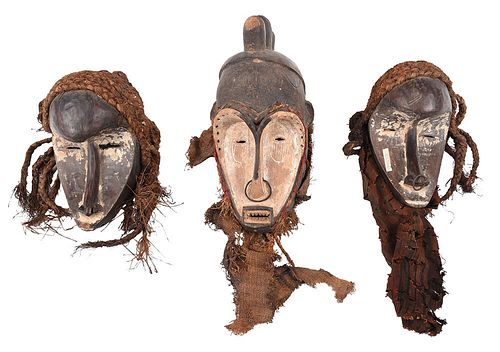 FIVE WEST AFRICAN CARVED AND
