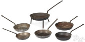 FIVE WHITFIELD SKILLETS AND A