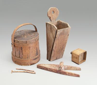 Five wooden objects: bootjack