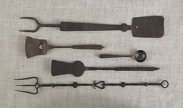 Five wrought iron utensils to