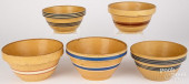 FIVE YELLOWWARE MIXING BOWLS<b