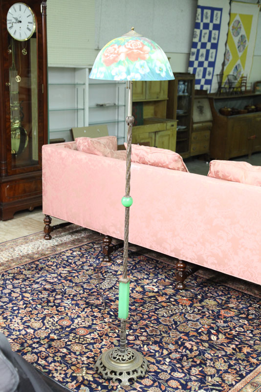 FLOOR LAMP. Brass having a