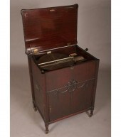 Floor model music box; mfg. by