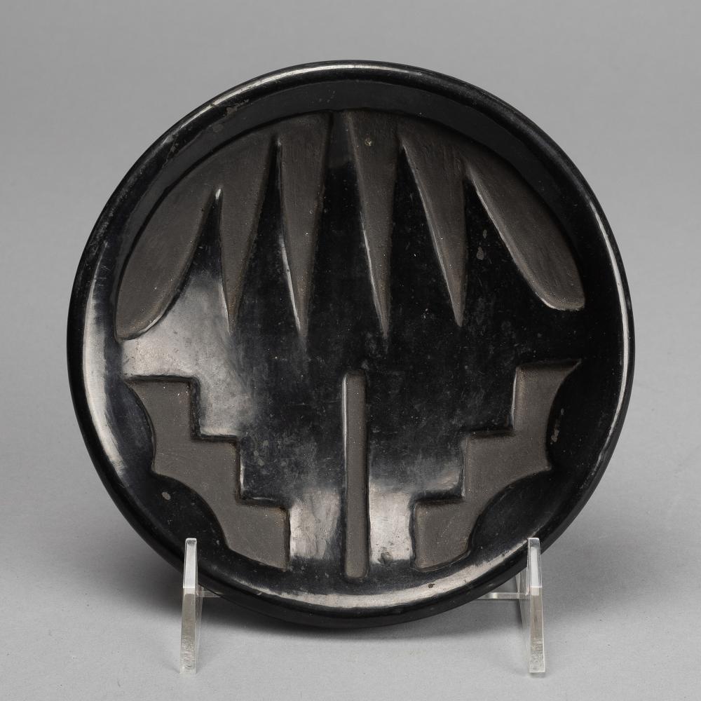 FLORA NARANJO, BLACKWARE PLATE WITH