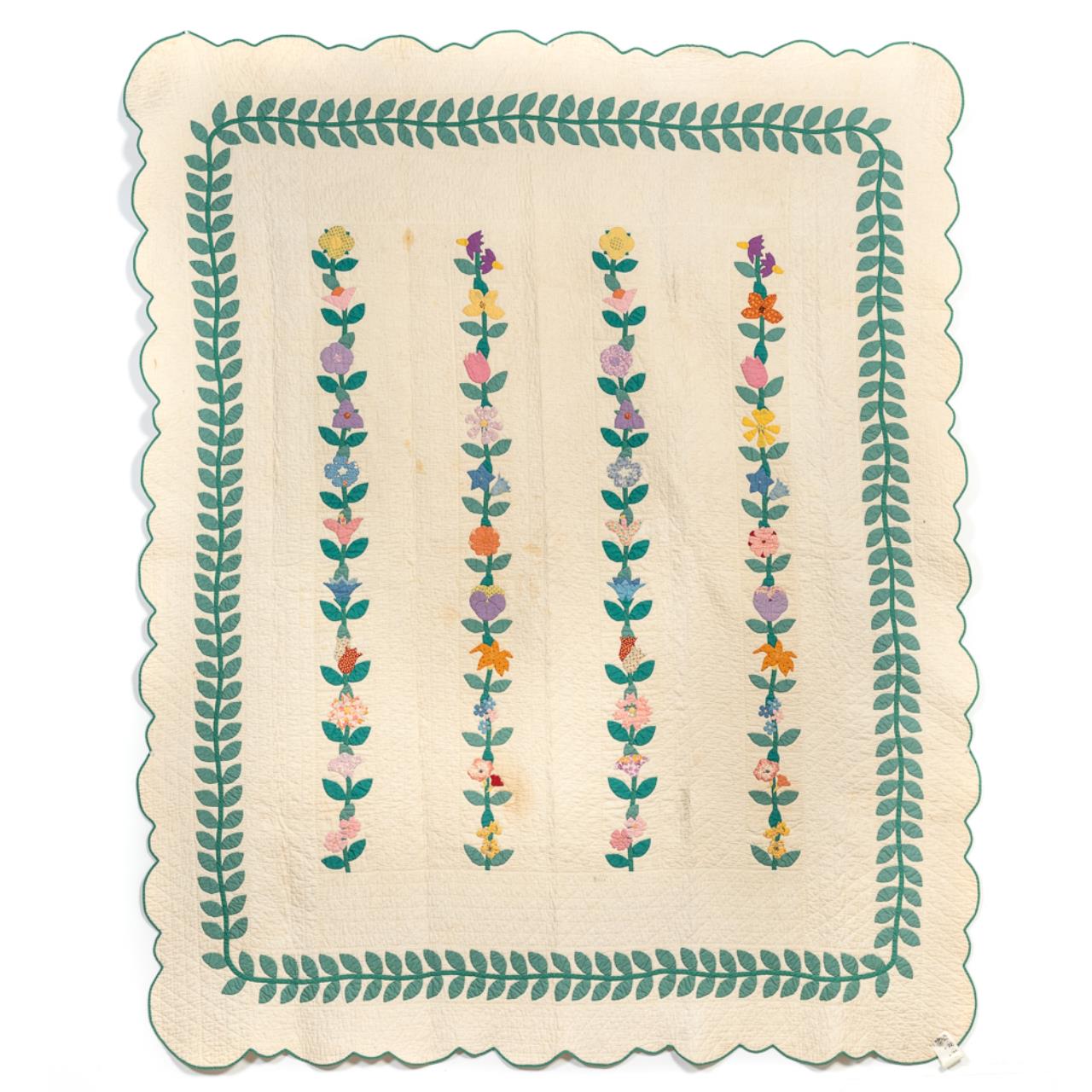 FLORAL AND VINE PATTERNED QUILT, C.