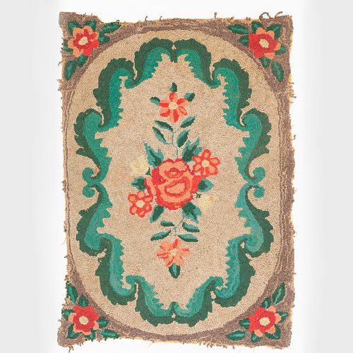 FLORAL HOOKED RUG AND A GEOMETRIC