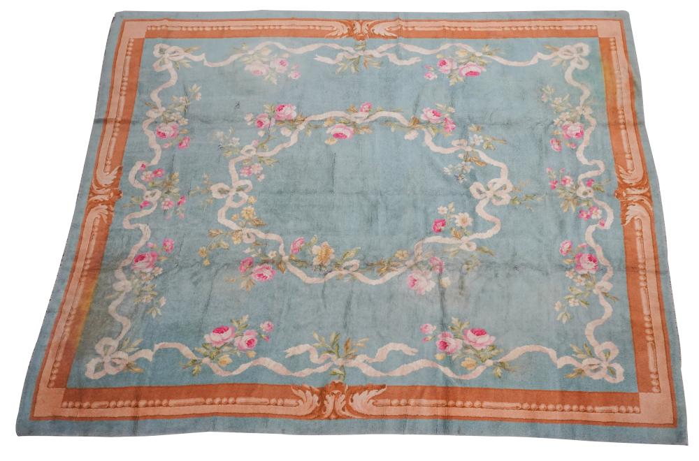 FLORAL RUG20th century; wool pile