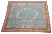 FLORAL RUG20th century; wool p