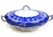 Flow blue covered dish  footed