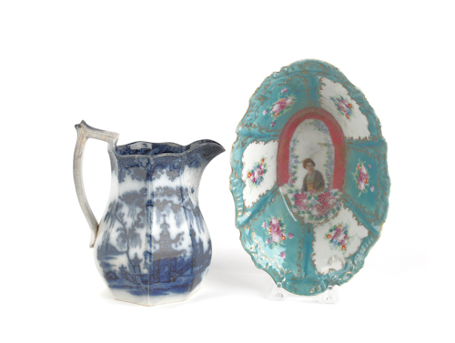 Flow blue pagoda pitcher late
