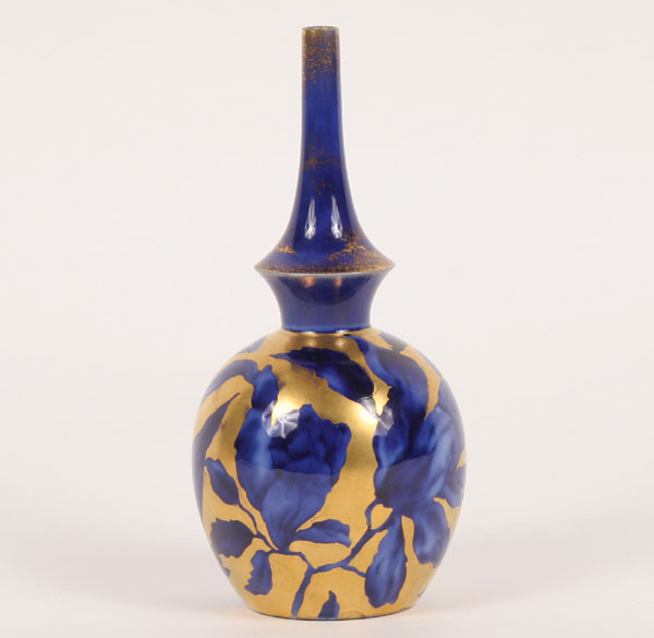 Flow blue vase decorated with