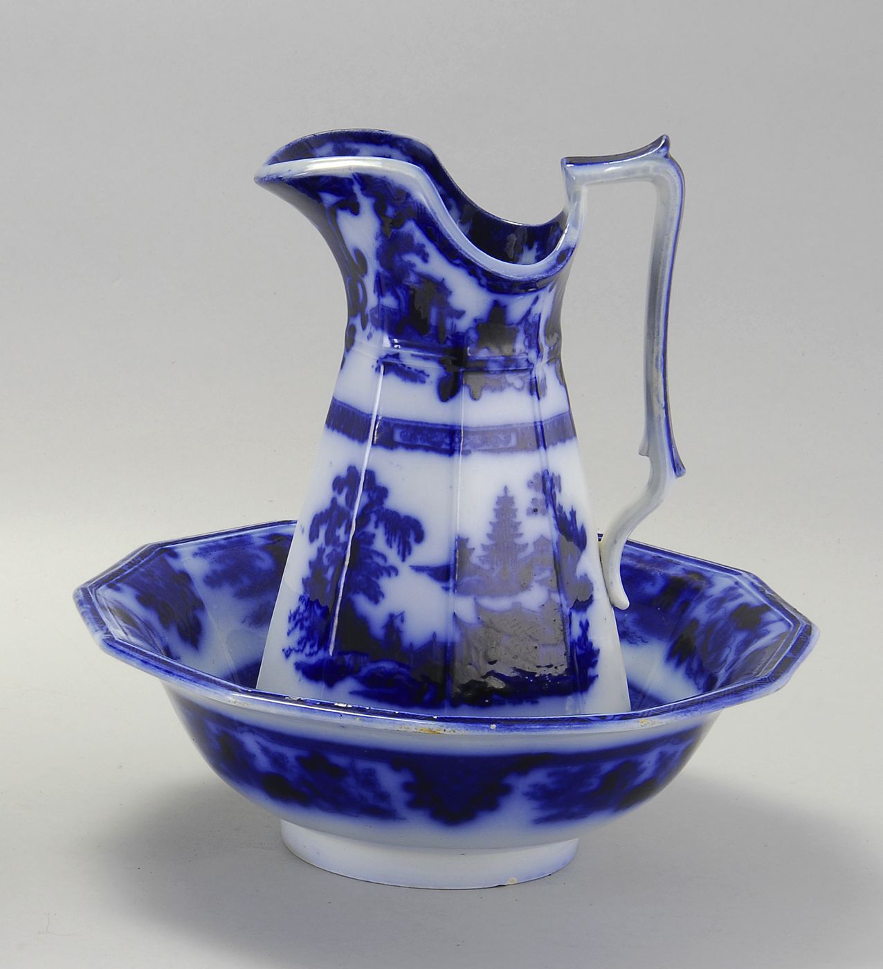 FLOW BLUE WASHBOWL AND