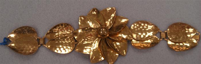 Flower bracelet of hammered copper