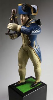 FOLK ART CARVED FIGURE OF ADMI