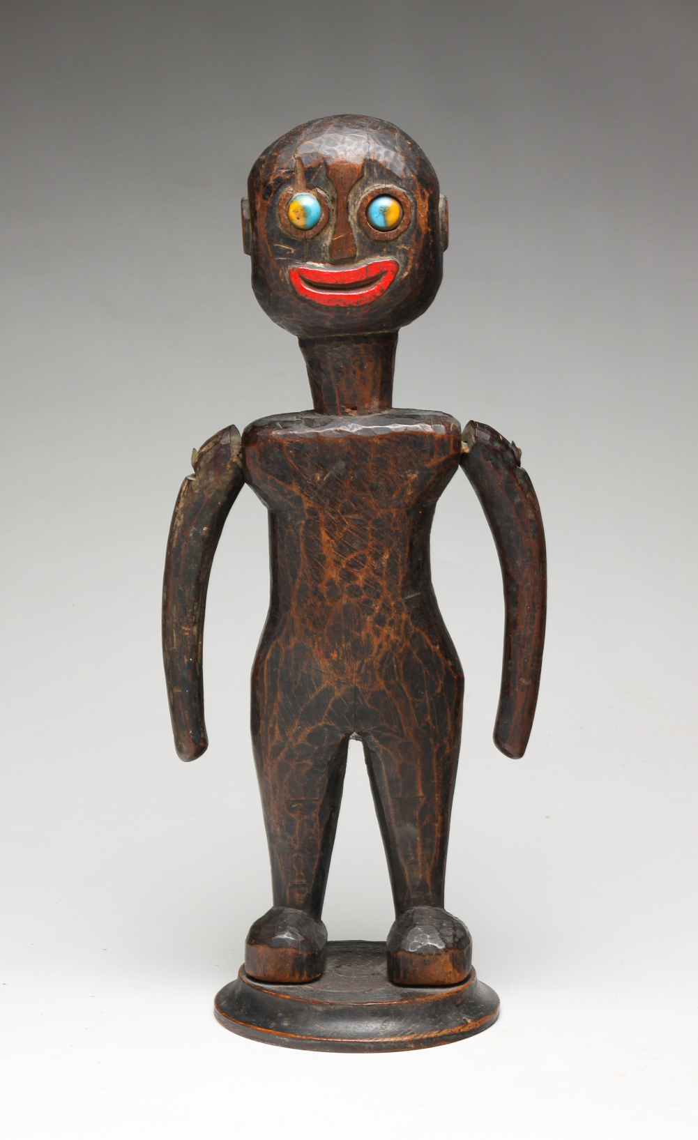 FOLK ART CARVED FIGURE. Probably
