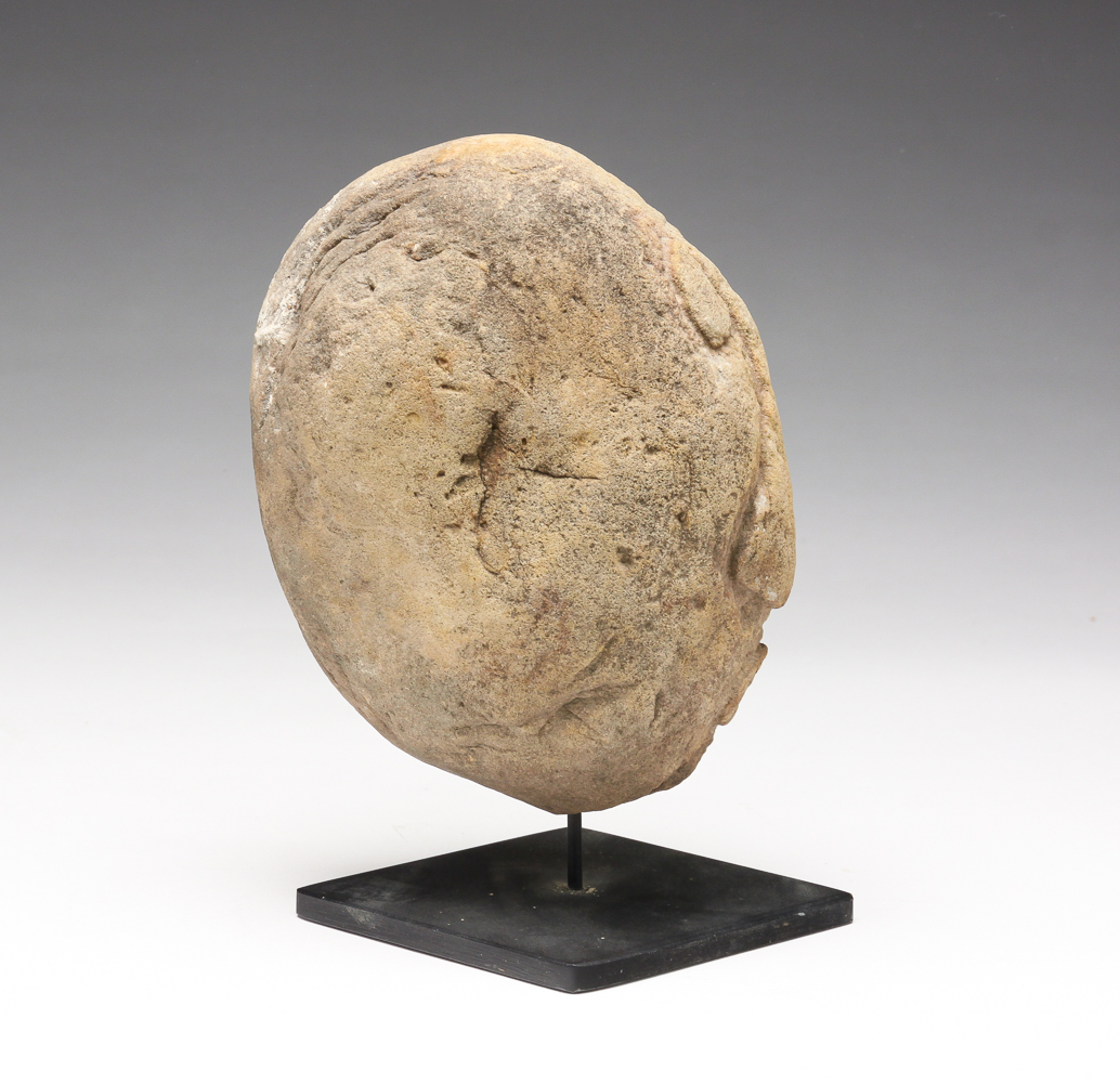 FOLK ART CARVED STONE FACE.